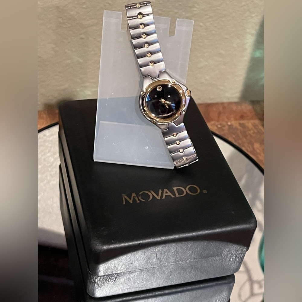 Movado womenโs watch, excellent used condition.